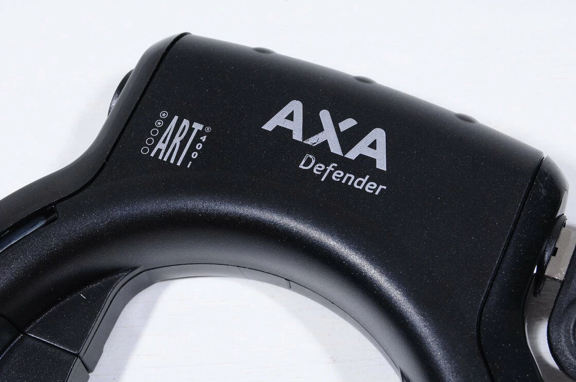 Blokada AXA Defender + zamek do baterii Gazelle Impulse