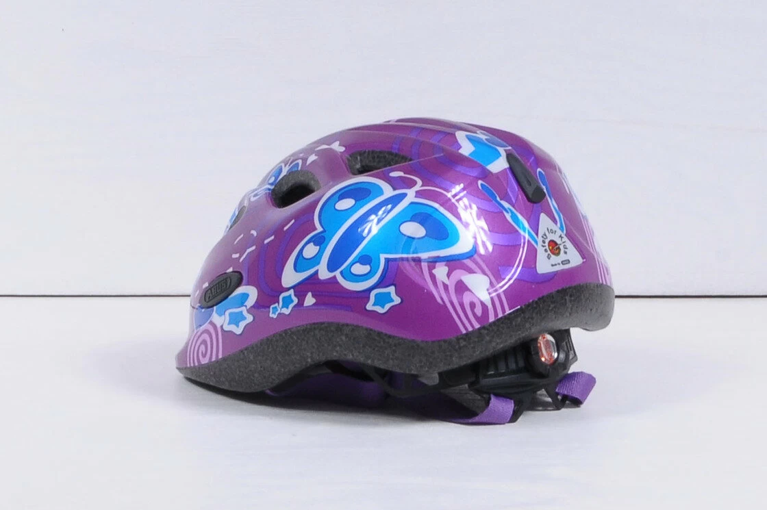 Dziecięcy kask rowerowy Abus Smiley 2.0, Pink Butterfly Rozmiar S: 45-50 cm