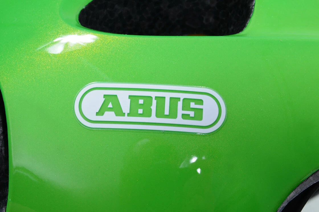 Dziecięcy kask rowerowy Abus Youn-I MIPS, zielony Rozmiar M: 52-57 cm