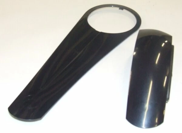 Elementy osłony łańcucha rowerowego Mildly Geometric stosowanej w rowerach Gazelle