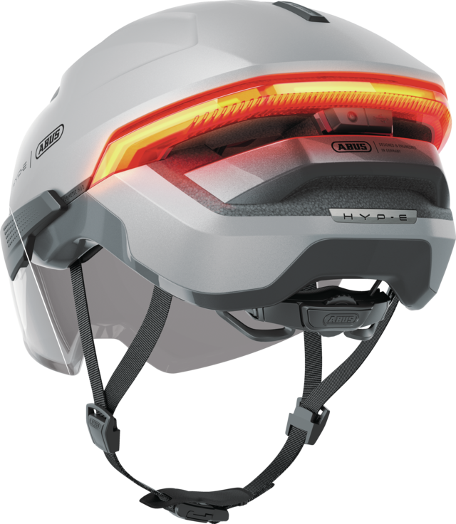 Kask rowerowy z kierunkowskazami Abus Hyp-E ACE Gleam Silver Rozmiar L: 57-61 cm