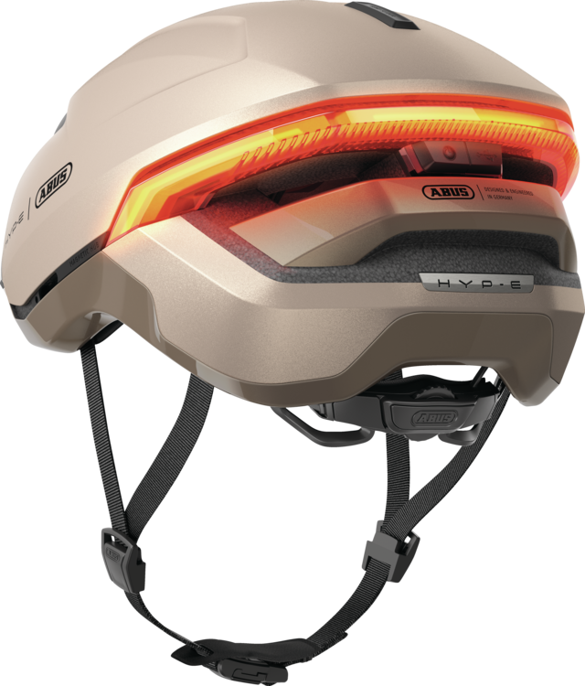 Kask rowerowy z kierunkowskazami Abus Hyp-E Champagne Gold