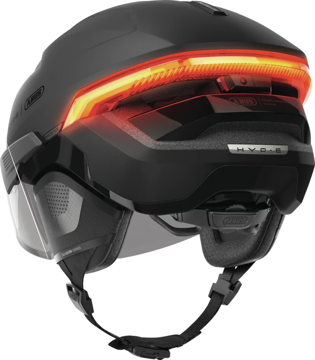 Kask rowerowy z kierunkowskazami i światłem hamowania Abus Hyp-E BL.ACE Volcano Titan