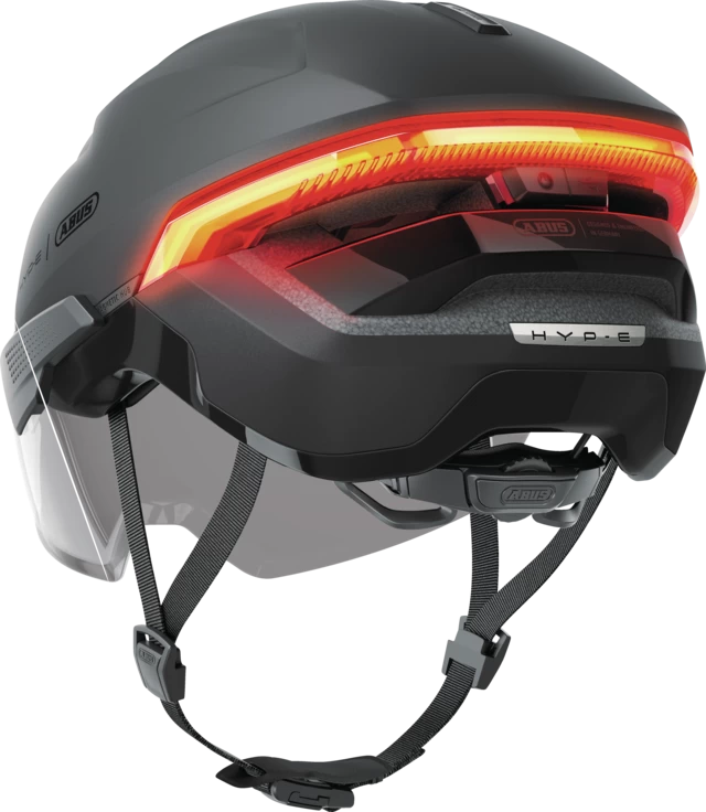 Kask rowerowy z kierunkowskazami i światłem hamowania Abus Hyp-E BL.ACE Volcano Titan