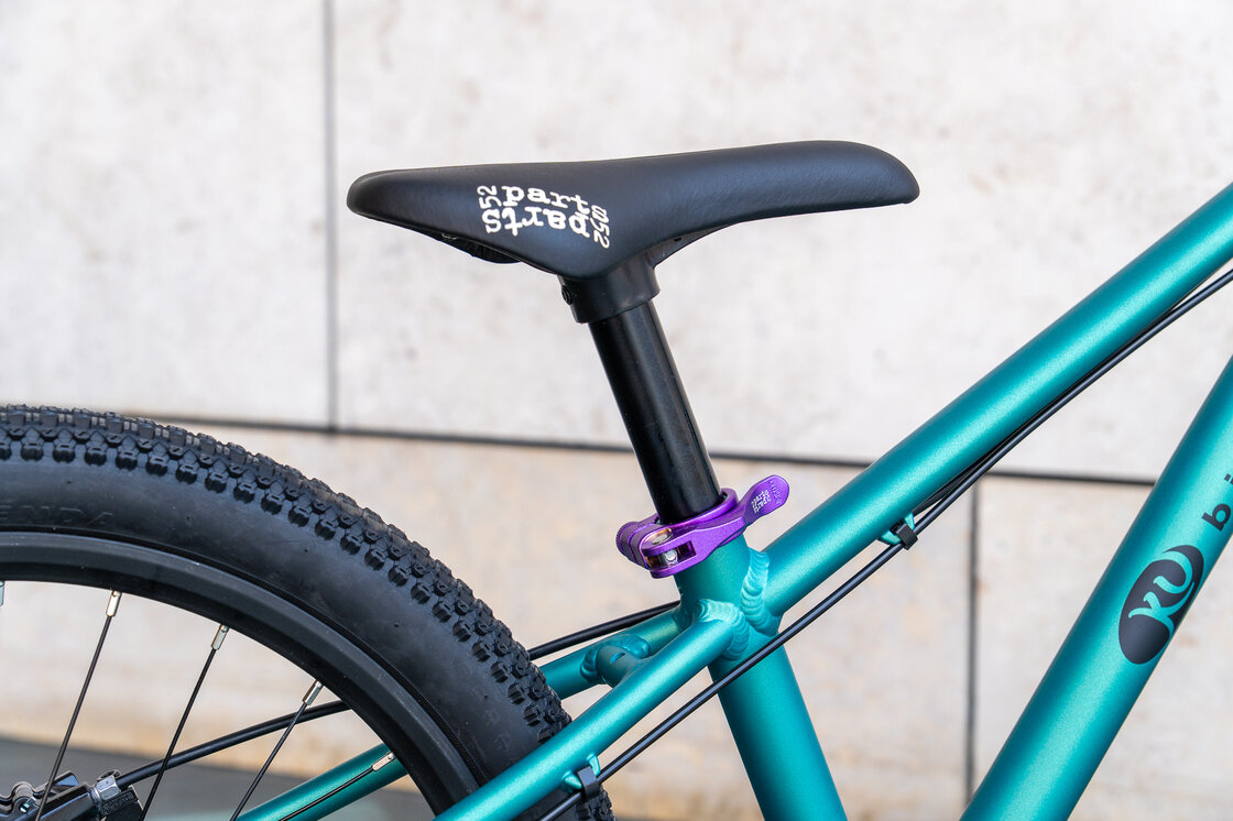 Lekki rowerek amortyzowany KUbikes 20 S MTB DISC Turkusowy + Laser Purple