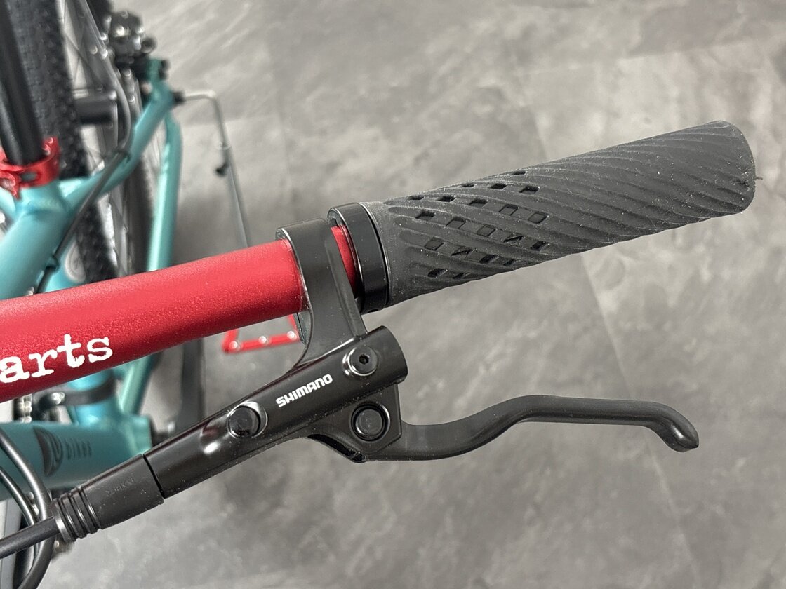 Lekki rowerek amortyzowany KUbikes 20 S MTB DISC turkusowy + laser red
