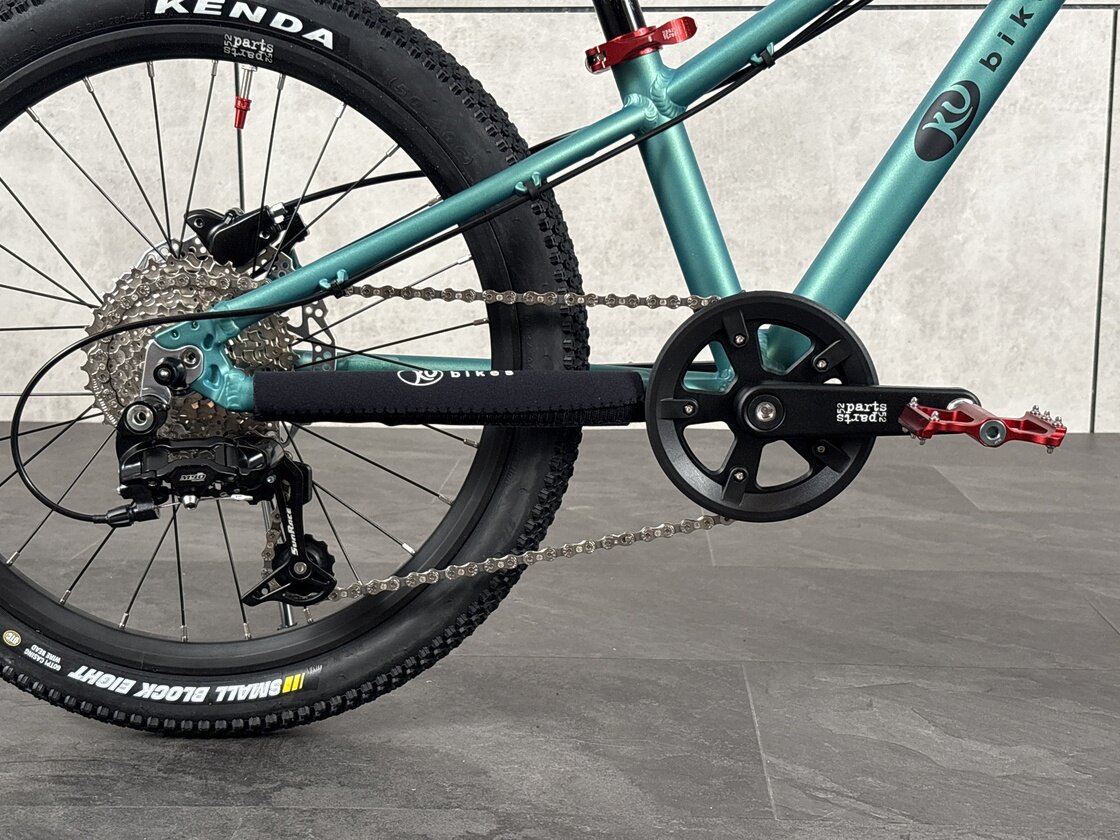 Lekki rowerek amortyzowany KUbikes 20 S MTB DISC turkusowy + laser red