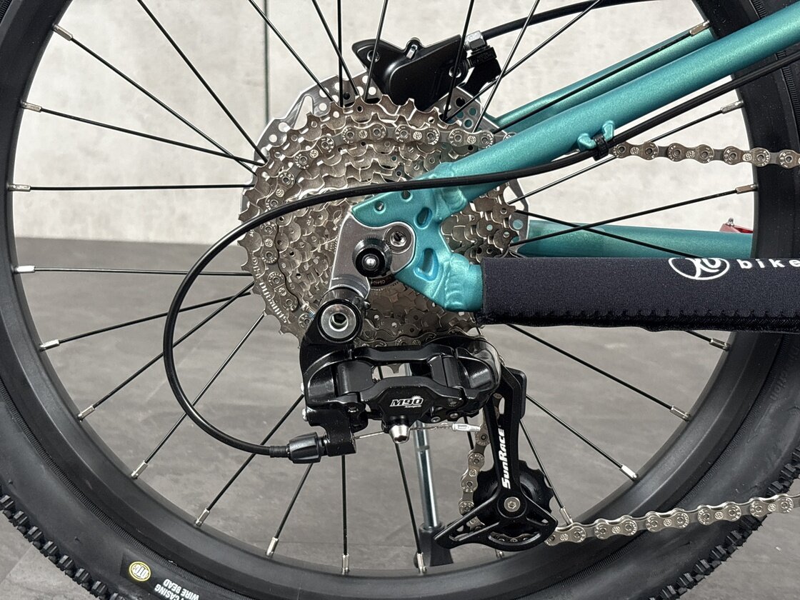 Lekki rowerek amortyzowany KUbikes 20 S MTB DISC turkusowy + laser red