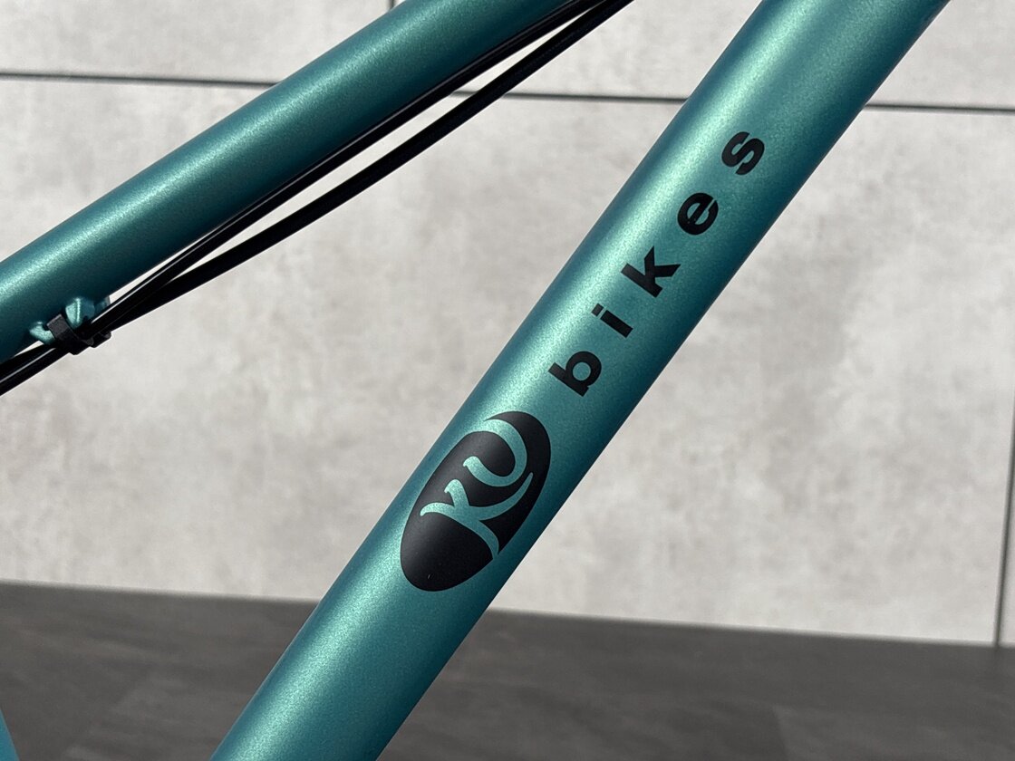 Lekki rowerek amortyzowany KUbikes 20 S MTB DISC turkusowy + laser red