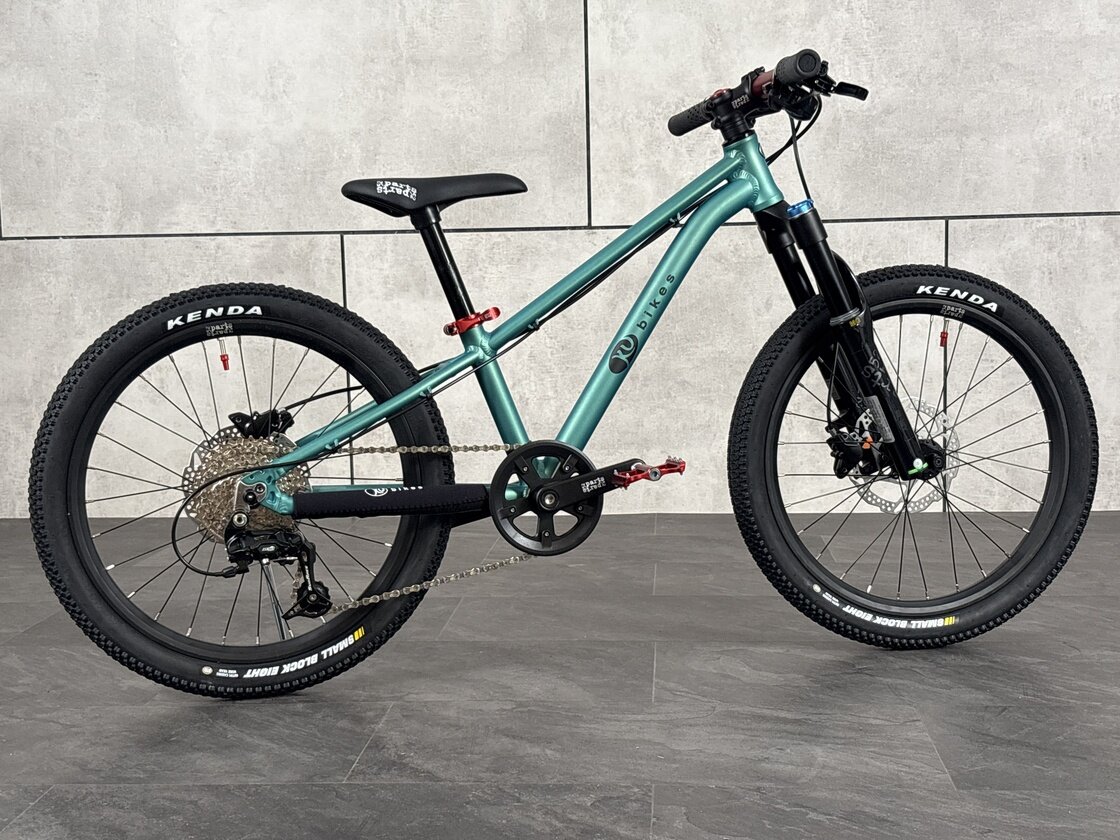Lekki rowerek amortyzowany KUbikes 20 S MTB DISC turkusowy + laser red