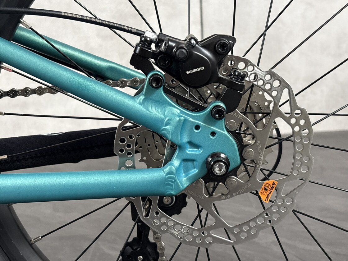 Lekki rowerek amortyzowany KUbikes 20 S MTB DISC turkusowy + laser red