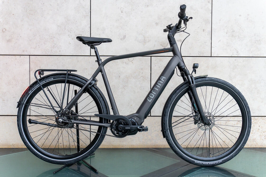 Rower elektryczny na pasku Cortina E-Mozzo Pro Shimano Steps 500Wh Męski Eclips Black Mat 56