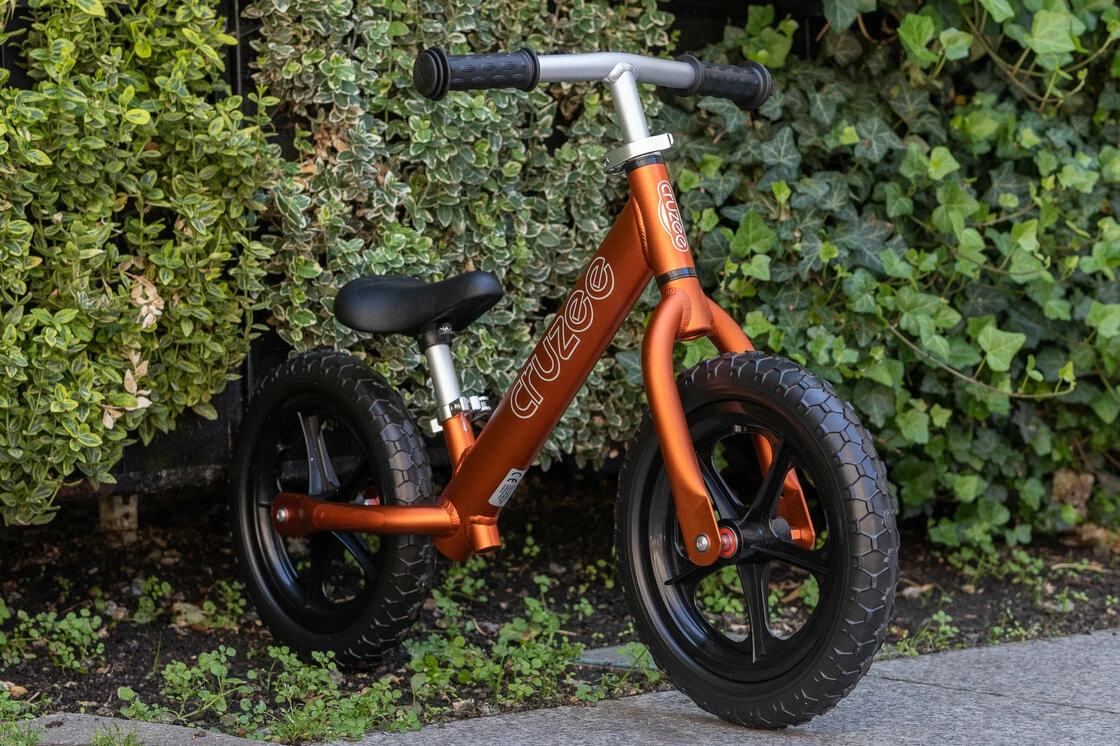Rowerek biegowy CRUZEE 12" Czarne Koła lekki Pomarańczowy